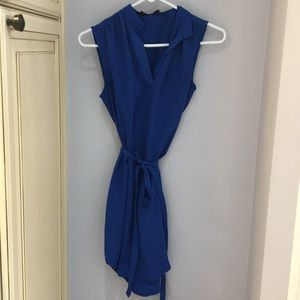 Navy blue dress with a strap in the middle
